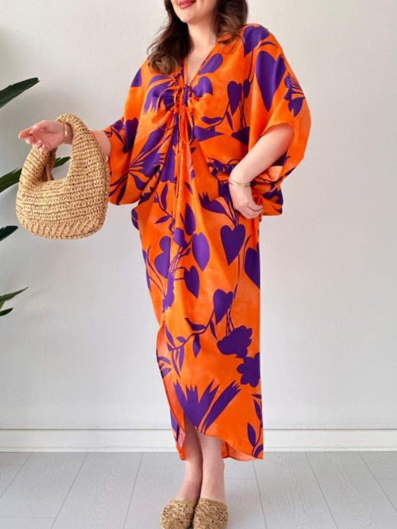 ARAVESSA – PRINTED BAT SLEEVE V-NECK DRESS