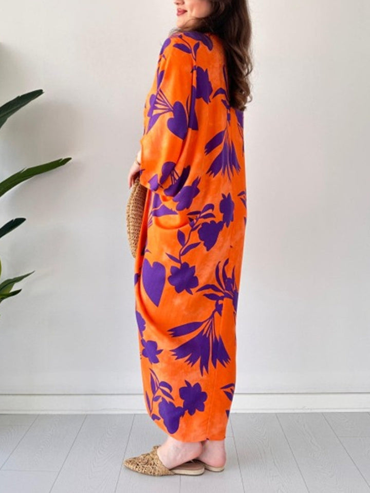 ARAVESSA – PRINTED BAT SLEEVE V-NECK DRESS